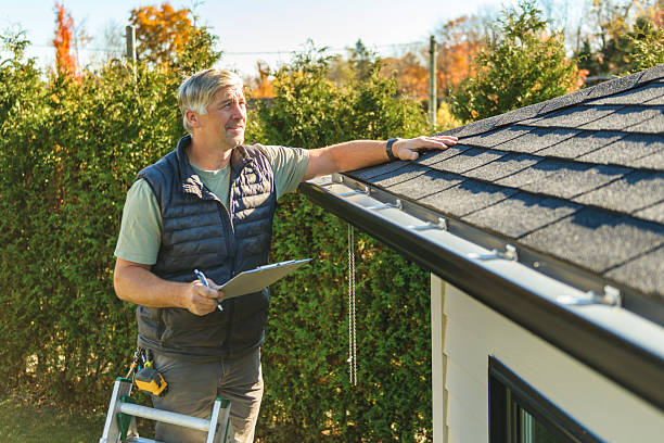 Professional Roofing technician working in Adel, IA